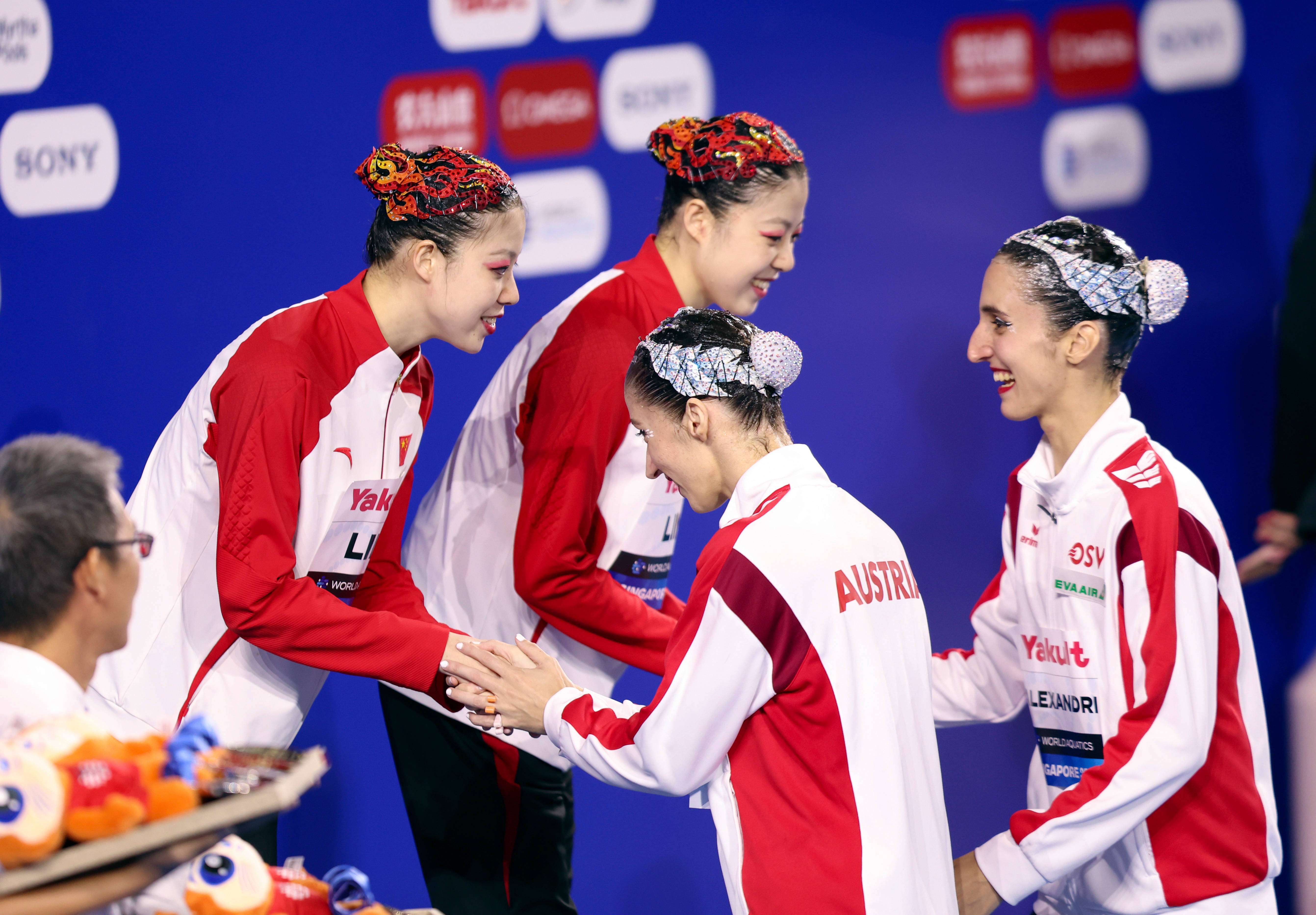 中国花游队再次夺冠,团体实力强劲 中国花游队再次夺冠,团体实力强劲